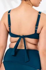 Soutien de baño con aro, color petróleo. Breteles anchos regulables y nudo en la espalda. Confeccionado con tela que contiene fibra LYCRA® XTRA LIFE™