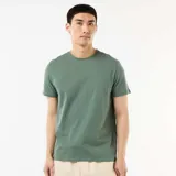 Camiseta de punto de corte recto y cuello redondo, con mangas cortas y diseño liso.