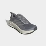 Championes de running Adidas Supernova Ease 2, color gris con detalles en plateado y suela blanca. Presentan exterior de tela técnica, mediasuela Dreamstrike para mayor amortiguación y suela de caucho soplado para una tracción dinámica.