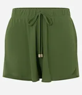 Short corto blanco de crepé con cintura elástica, cordón ajustable con punteras doradas y ruedo redondeado, diseñado como salida de playa por Bossa Nossa.