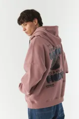 Canguro gris de felpa con capucha, corte holgado y puños y cintura acanalados. Estampado en la espalda con la frase "I brought a lemon to a knife fight" y un dibujo de un limón.