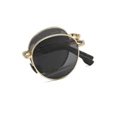 Lentes de sol unisex con montura redonda dorada y lentes grises.