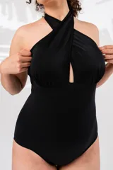 Malla entera color marrón con escote halter cruzado y espalda recta. Confeccionada con tela que contiene fibra LYCRA® XTRA LIFE™.