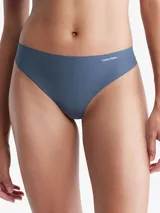 Colaless Calvin Klein de microfibra azul con bordes cortados a láser y logo estampado en la cadera.