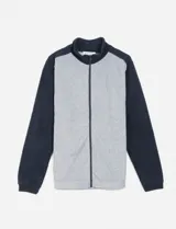 Campera de estilo casual con cierre frontal completo, confeccionada en tejido jaspeado con paneles lisos en hombros, cuello alto y puños acanalados.