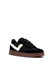 Championes Pony modelo Empire, color negro con detalles en blanco y suela de goma marrón. Presenta el logotipo lateral en forma de V y cordones negros con tramado reflectivo.