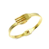 Pulsera rígida dorada con forma de tenedor y cuchara, ideal para chefs.