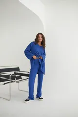 Conjunto de pantalón y blusa color beige, de punto morley.