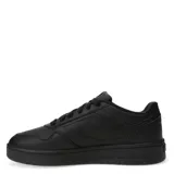 Championes Puma Court Classic de estilo urbano inspirado en el tenis, con diseño de líneas limpias y detalles en dorado. Presentan una parte superior de material sintético con perforaciones laterales para mayor ventilación y una suela de goma resistente.