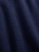 Buzo de punto con cuello redondo y mangas largas, de calce ajustado y diseño liso.