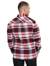 Camisa de manga larga de Caterpillar con diseño a cuadros en tonos rojo, blanco y azul marino. Cuenta con cuello clásico, cierre frontal de botones, dos bolsillos en el pecho con solapa y botones, y un parche con el logo de la marca.