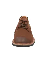 Zapato de cuero marrón tipo derby con cordones, suela de EVA negra y detalles en contraste en el talón.