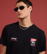Remera negra de algodón con estampado de un auto de carreras y texto "Motor Sport World Champion Team Adrenaline Birmingham Grand Prix".