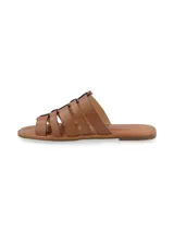 Sandalias planas Atenas de cuero color tostado, con diseño de capellada de múltiples tiras entrelazadas y puntera cuadrada.