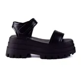 Sandalias negras con plataforma Korium Forli, con dos tiras anchas sobre el empeine y ajuste con velcro en el tobillo.