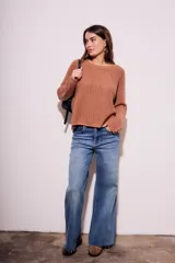 Sweater celeste de tejido de punto calado con lurex, de corte holgado y mangas largas.