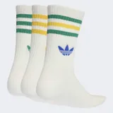 Pack de tres pares de medias Adidas de caña media, color blanco con detalles de rayas y logo del trifolio en diferentes colores.