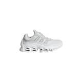Championes Adidas Adifom Megaride, color blanco con detalles metálicos plateados, diseño futurista con suela gruesa y aberturas características.