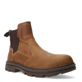 Botas Chelsea Caterpillar modelo Practitioner, confeccionadas en cuero color beige oscuro. Presentan paneles laterales elásticos en color marrón, costuras reforzadas en contraste y suela de goma dentada para mayor tracción.