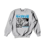 Buzo gris de cuello redondo y manga larga, con estampa frontal estilo manga en blanco y negro con detalles en azul, inspirada en la serie Supercampeones.