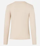 Blusa de algodón color negro, de corte ajustado, con cuello redondo y mangas largas.