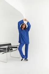 Conjunto de pantalón y blusa color beige, de punto morley.