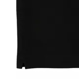 Chomba Lacoste Polo Paris lisa color borgoña, de piqué de algodón orgánico, corte entallado y cuello polo con dos botones.