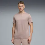 Remera de entrenamiento Puma de cuello redondo y manga corta, con logo de la marca estampado en el centro del pecho. Presenta un acabado jaspeado en tono rosa viejo.