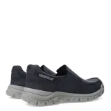 Zapatos tipo slip-on de la marca Caterpillar, confeccionados en lona de color azul marino con suela de goma gris de alta tracción. Presentan costuras reforzadas en la puntera y el logo de la marca en el lateral y la parte frontal de la suela.