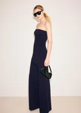 Pantalón wide leg de tiro medio, confeccionado en punto fino de viscosa, sin cierre.