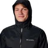 Campera cortaviento Columbia con tecnología impermeable y transpirable, capucha integrada, cierre frontal, ventilación en axilas y puños ajustables.