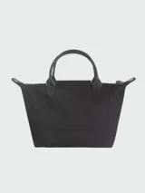 Cartera de mano Longchamp modelo Le Pliage Energy tamaño S, confeccionada en lona de color bordó con detalles en cuero negro. Cuenta con doble asa superior, correa de hombro ajustable y extraíble, cierre principal con cremallera y solapa frontal con broche a presión.