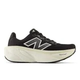 Championes de running New Balance modelo More V5, color negro con entresuela de espuma Fresh Foam X en tono crema. Presenta diseño de malla transpirable y logo lateral característico.