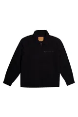 Campera de canvas con diseño utilitario, color negro, con cierre frontal y bolsillo con cierre en el pecho. Presenta cuello camisero y detalles metálicos en los tiradores de los cierres.