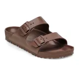 Sandalia Birkenstock modelo Arizona, confeccionada en material EVA ligero y resistente al agua. Presenta diseño de dos correas con hebillas ajustables y plantilla anatómica.