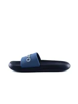 Chancletas Umbro modelo Twise para hombre, color negro, con tira ancha y el logo de la marca en relieve.