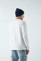 Remera negra de manga larga con estampa de pintura impresionista en el frente y texto 'Impression - Sunrise'.