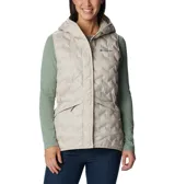 Chaleco acolchado Columbia con capucha, color beige, con cierre frontal y bolsillos laterales con cremallera. Presenta tecnología de sellado térmico y logo de la marca bordado en el pecho.