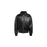 Campera bomber Adidas Premium Essentials color negro, de cuero sintético con cuello clásico, cierre frontal metálico y puños y cintura elásticos. Incluye el logo del trifolio bordado tono sobre tono en el pecho.