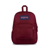 Mochila JanSport color borgoña con logo en etiqueta azul. Tiene un compartimento principal, bolsillo frontal con cremallera, bolsillo lateral para botella de agua, tirantes acolchados y panel trasero acolchado.
