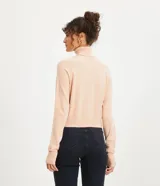 Blusa básica de punto marca Blue Steel, con cuello alto y manga larga. Confeccionada en tejido de punto recto con textura suave y cómoda.