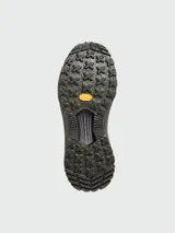 Zapatillas Moncler Trailgrip Lite color verde oliva, con cordones elásticos y suela de goma con tacos.