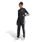 Conjunto deportivo Adidas Essentials 3 Tracksuit de mujer, color negro con las icónicas tres tiras blancas a los lados y el logo de la marca estampado en el pecho y la pierna. Incluye campera con cierre frontal y cuello alto, y pantalón con cintura elástica.