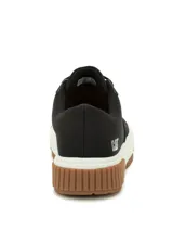 Sneakers Caterpillar modelo Amp Canvas, de color negro con suela de plataforma blanca y base de goma marrón. Capellada de lona con detalles de poliuretano, cordones negros y ojalillos metálicos. Presenta la inscripción de la marca en la lengüeta y en el lateral del talón.