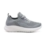 Championes deportivos American Sport color beige con detalles en rosa y suela blanca.