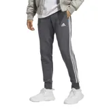 Pantalón de jogging gris con cintura elástica ajustable con cordón, bolsillos laterales y puños acanalados. Diseño con tres rayas blancas verticales a los costados y logo de Adidas bordado en blanco.