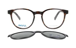 Lentes de marco completo con diseño carey, que incluyen un clip-on magnético polarizado de color negro para convertir los lentes de receta en lentes de sol.