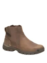 Bota Chelsea Caterpillar modelo Threshold para hombre, confeccionada en cuero marrón con paneles elásticos laterales y suela de goma con relieve.