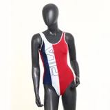 Malla enteriza de natación Fila, color azul marino con ribetes blancos y logo de la marca estampado en el pecho.