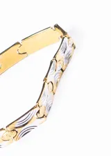 Pulsera brazalete enchapada en oro y plata con eslabones rectangulares y cierre desplegable.